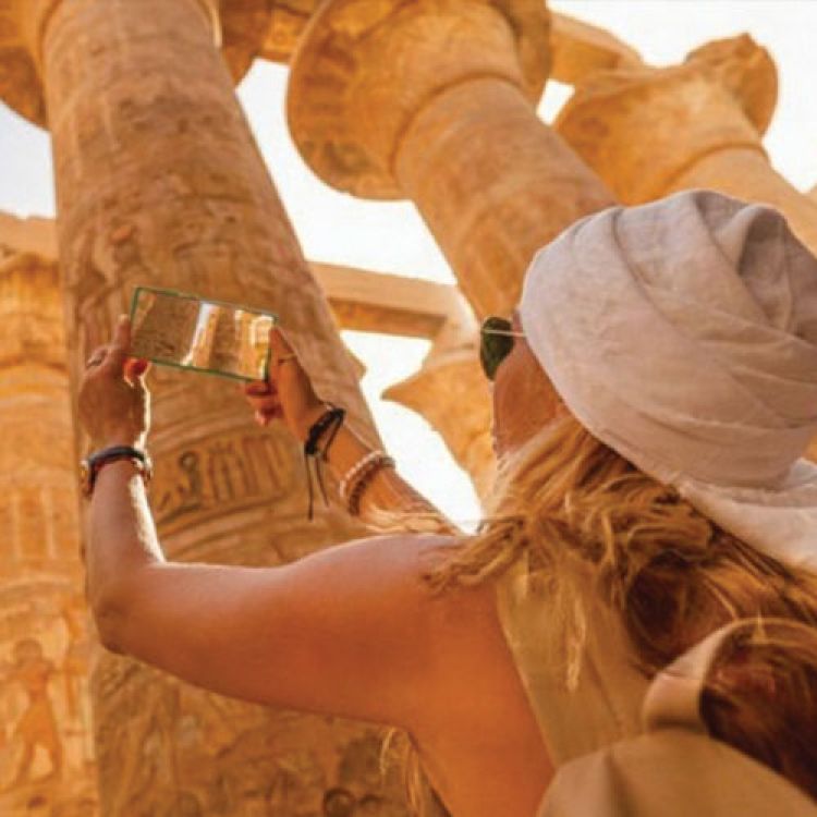 Tourist at Luxor taking video from mobile